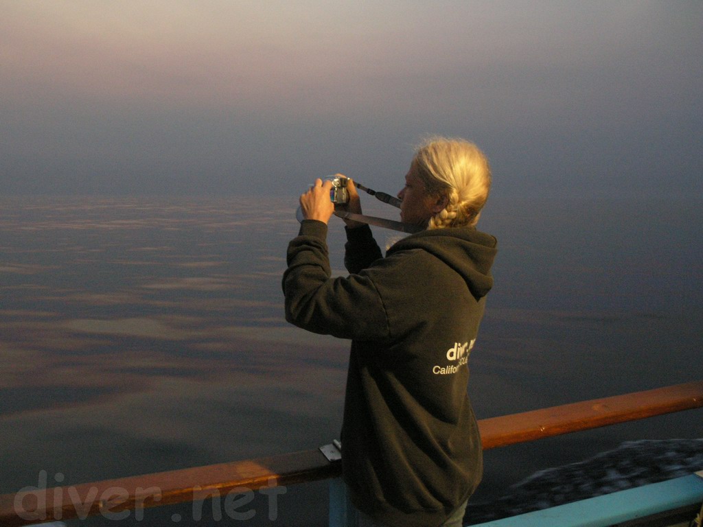 Elaine takes pictures of Sunrise on the way to Cortes Bank