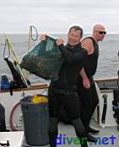 Mike Delaney with a bag of bugs [Panulirus interruptus (California Spiny Lobster)]