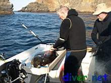 David Vilhauer cleans his halibut