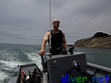 Eric Sedletzky at the helm of his boat