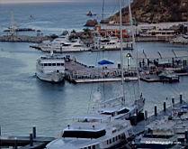 The Nautilus Explorer at the enf of the customs dock in Cabo San Lucas harbor.